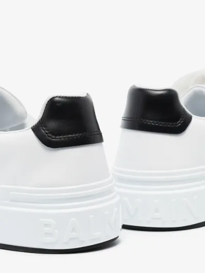 black and white slip on sneakers