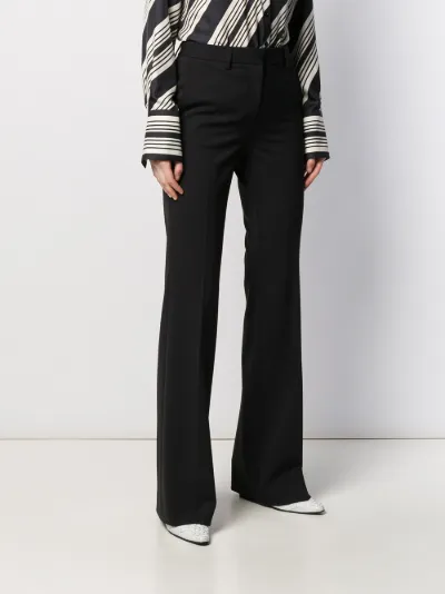 white tailored flared trousers