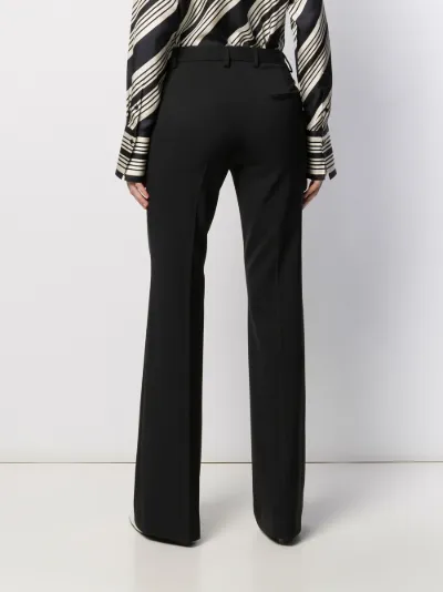 white tailored flared trousers