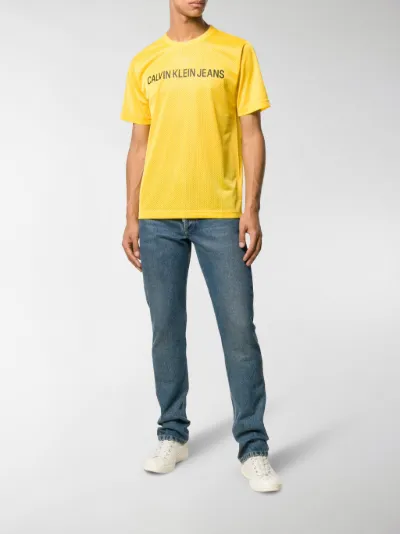 calvin klein jeans yellow shirt
