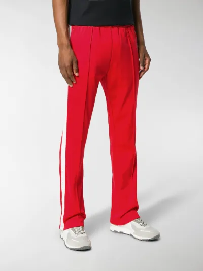 Calvin Klein Jeans Pantaloni con striscia laterale rosso | MODES