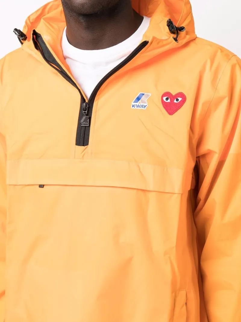 k way orange jacket