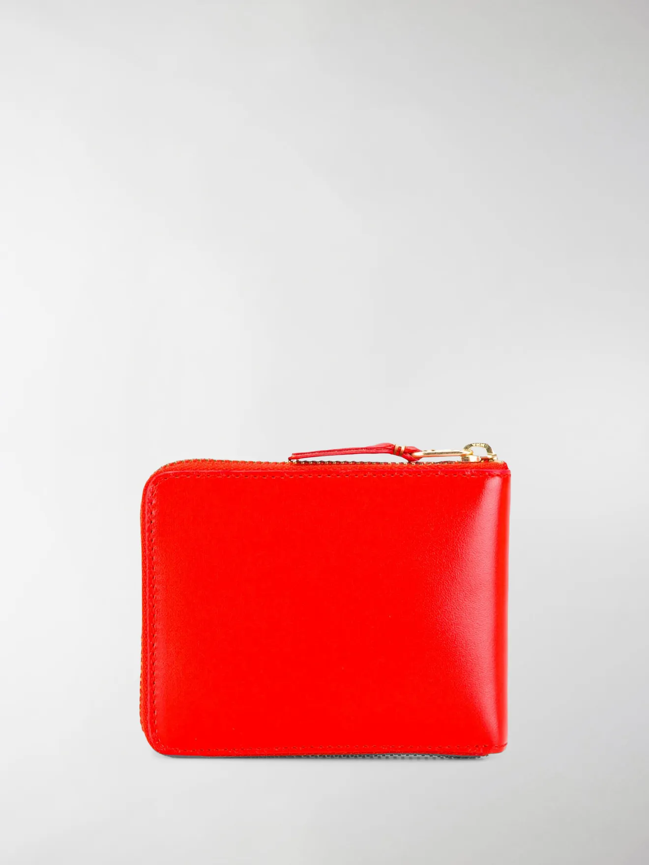 comme des garcons zip around wallet que significa