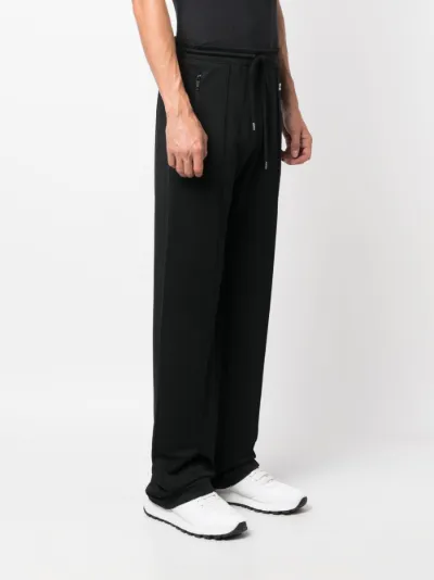 Courrèges logo-patch track pants | Eraldo.com LT