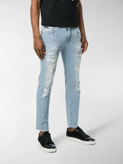 heavily distressed jeans