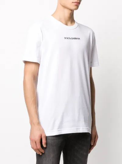 usually dressed in black tee