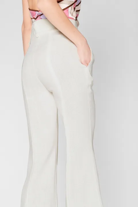 white kick flare trousers