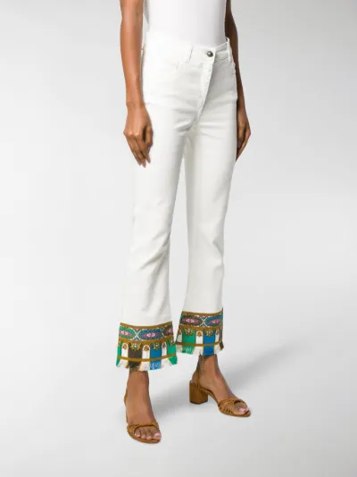 jeans with embroidered hem