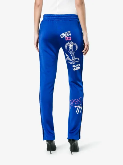 popper track pants womens