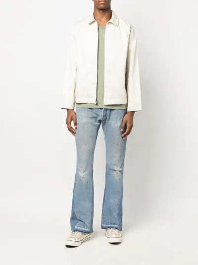 distressed flared denim jeans | GALLERY 