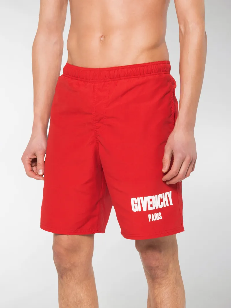 Givenchy Pantaloncini da mare con logo rosso | MODES