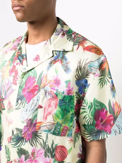 green shirt with pink flowers