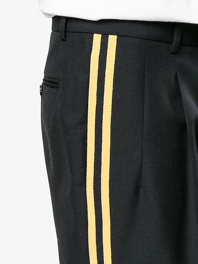 gucci pants with stripe down the side