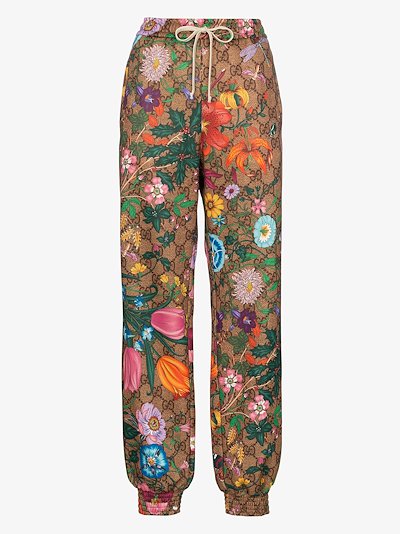 Gucci Flora GG Supreme Pattern Track Pants | Browns Gucci Flora GG Supreme Pattern Track Pants | Browns