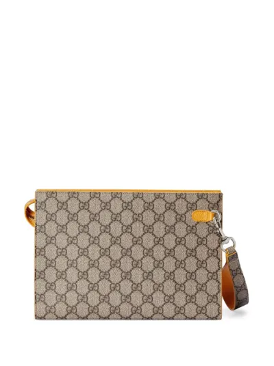 Gucci GG canvas logo plaque clutch bag Eraldo FR