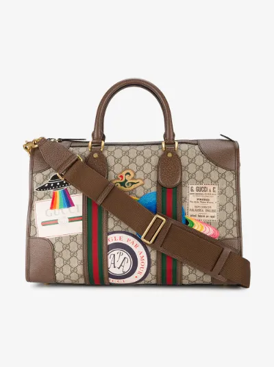 gucci supreme duffle