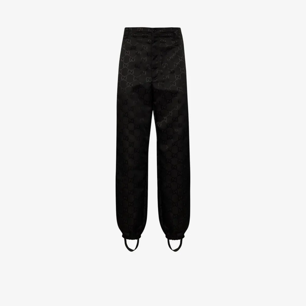 Gucci Monogram logo track pants Browns