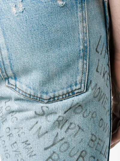 gucci jeans with writing