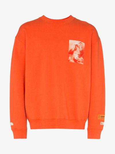 orange designer sweatshirt