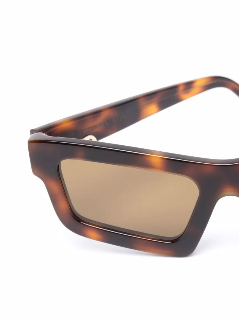 Huma Sunglasses Occhiali da sole Tilde geometrici marrone | MODES