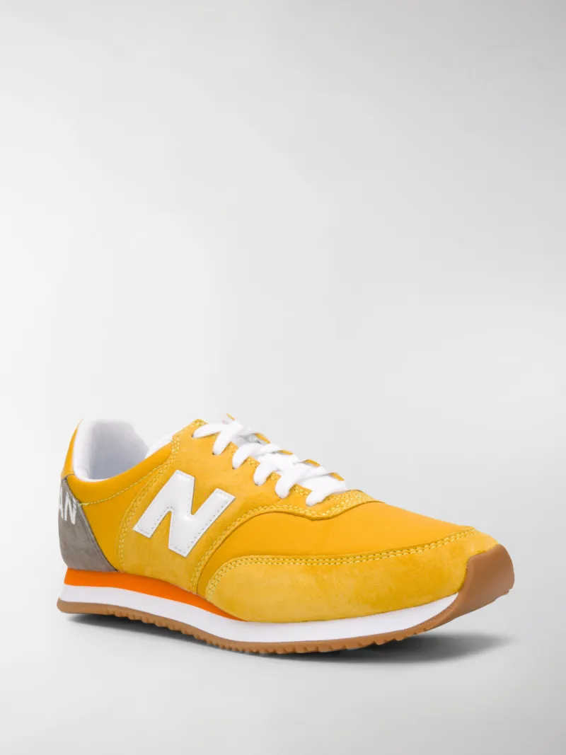 new balance 100 orange