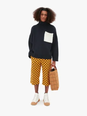 PATCH POCKET TURTLENECK JUMPER in blue | JW Anderson