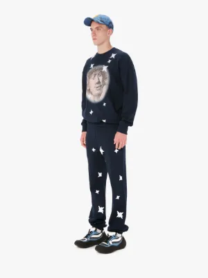 REMBRANDT STAR PRINT TRACK PANTS in blue | JW Anderson SG