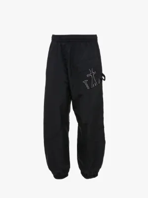 TWISTED JOGGERS WITH ANCHOR LOGO EMBROIDERY in black | JW Anderson