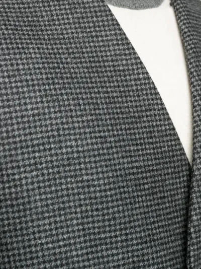 grey collarless coat