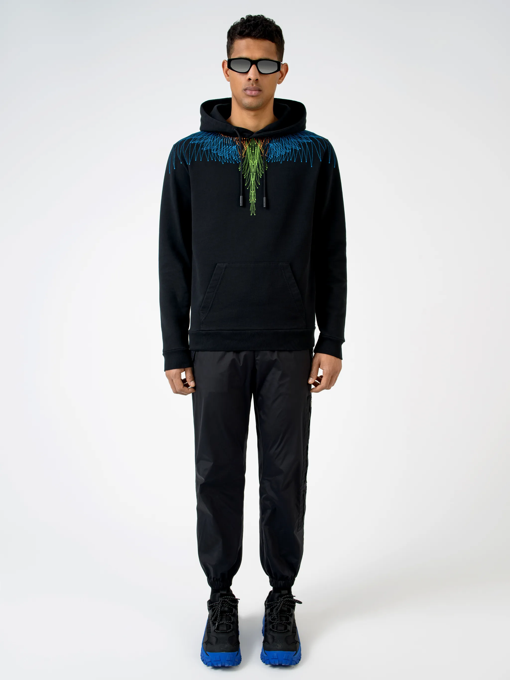 Black/blue/multicolour cotton graphic print hoodie from Marcelo Burlon County of Milan featuring classic hood, graphic print, feather print and long sleeves.