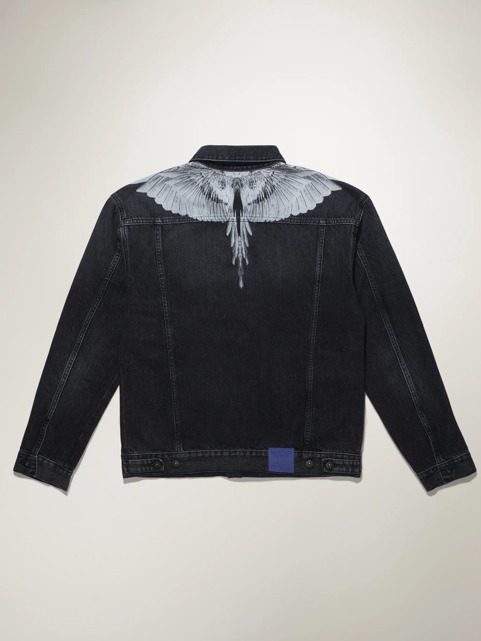 Black/white cotton-denim button-front denim jacket from Marcelo Burlon County of Milan featuring straight-point collar, front button fastening, long sleeves, wings print and front flap pockets.