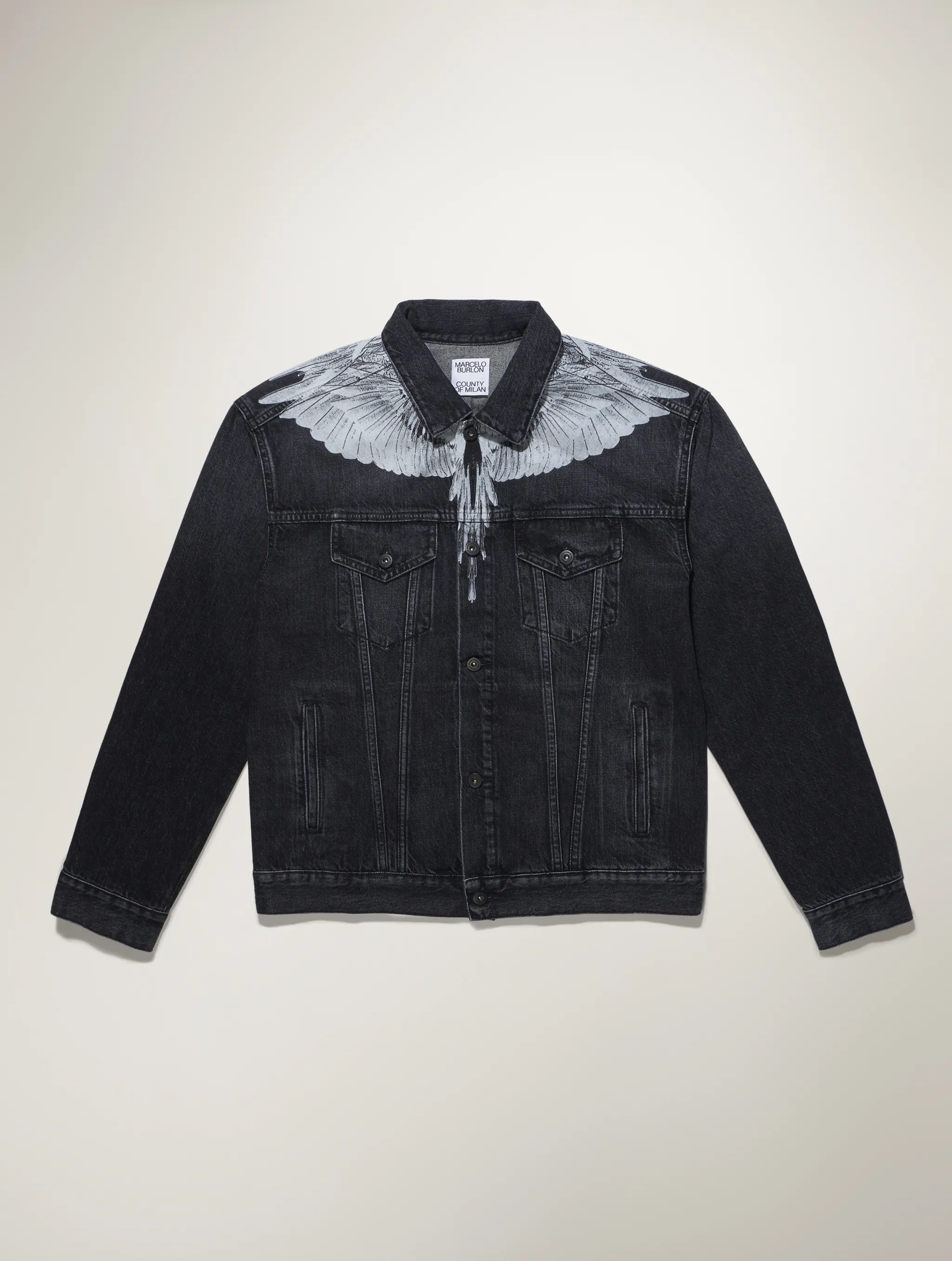 Black/white cotton-denim button-front denim jacket from Marcelo Burlon County of Milan featuring straight-point collar, front button fastening, long sleeves, wings print and front flap pockets.