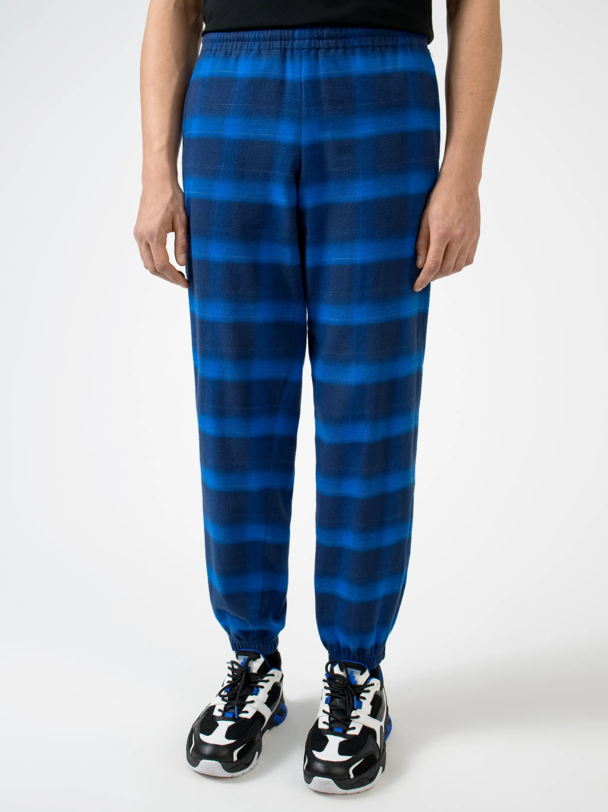 Blue/black cotton check-pattern tapered track pants from Marcelo Burlon County of Milan featuring check pattern, elasticated ankles, elasticated waistband, tapered design and two side slit pockets.