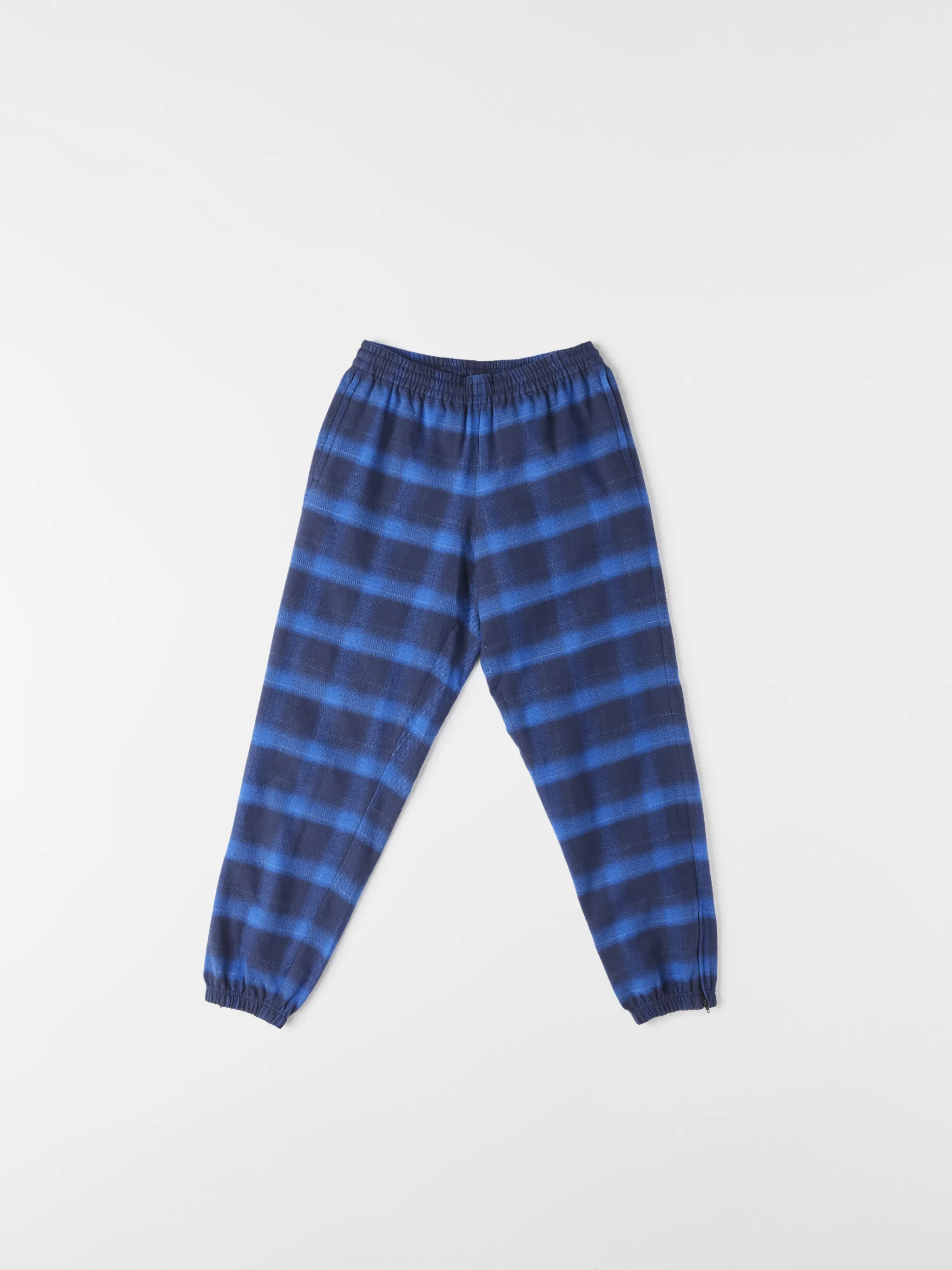 Blue/black cotton check-pattern tapered track pants from Marcelo Burlon County of Milan featuring check pattern, elasticated ankles, elasticated waistband, tapered design and two side slit pockets.
