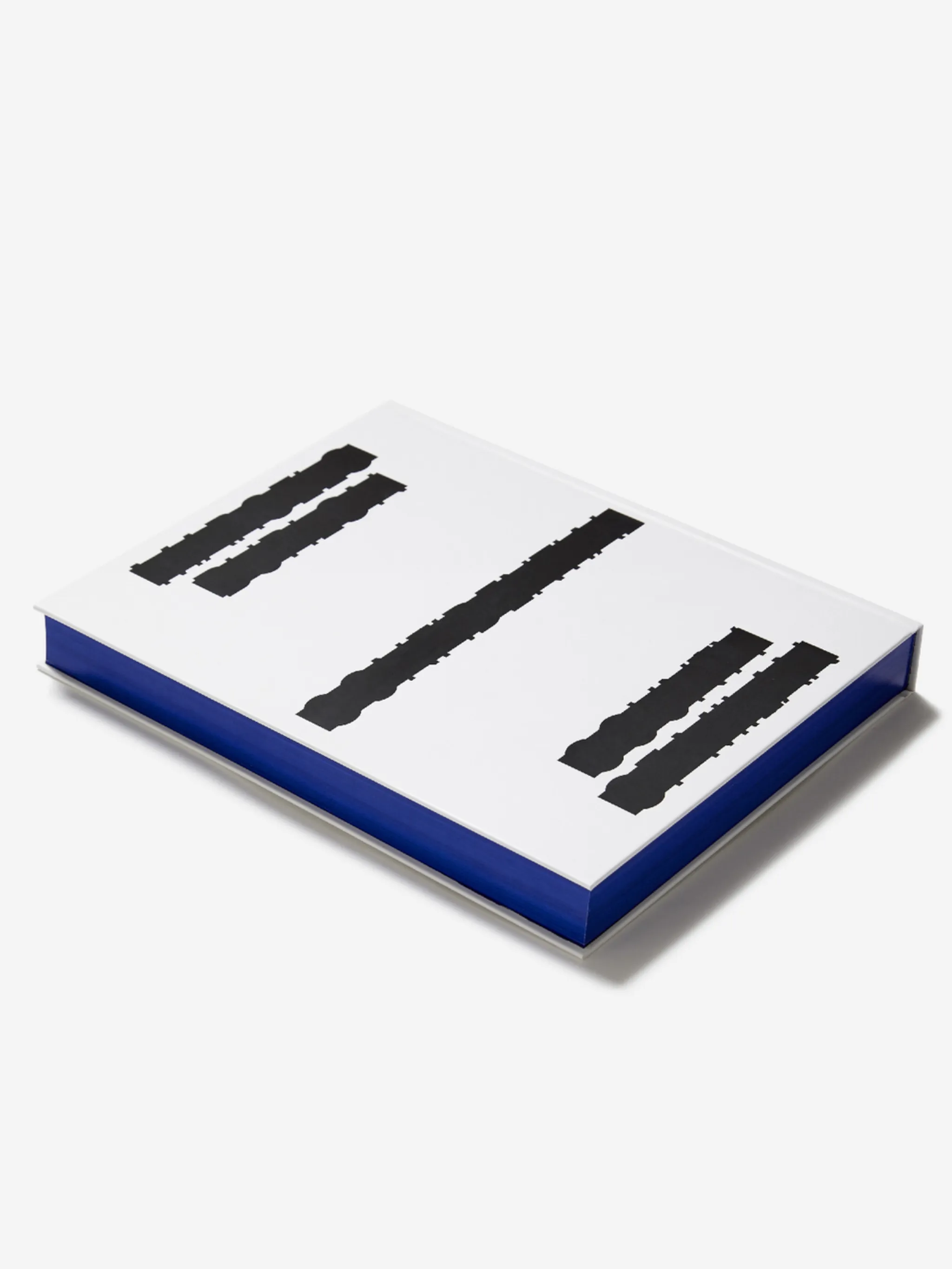 0110 WHITE BLACK WHITE BLACK Natural (Veg)->Paper CONFIDENTIAL INTERNATIONAL EDITION from Marcelo Burlon County of Milan.