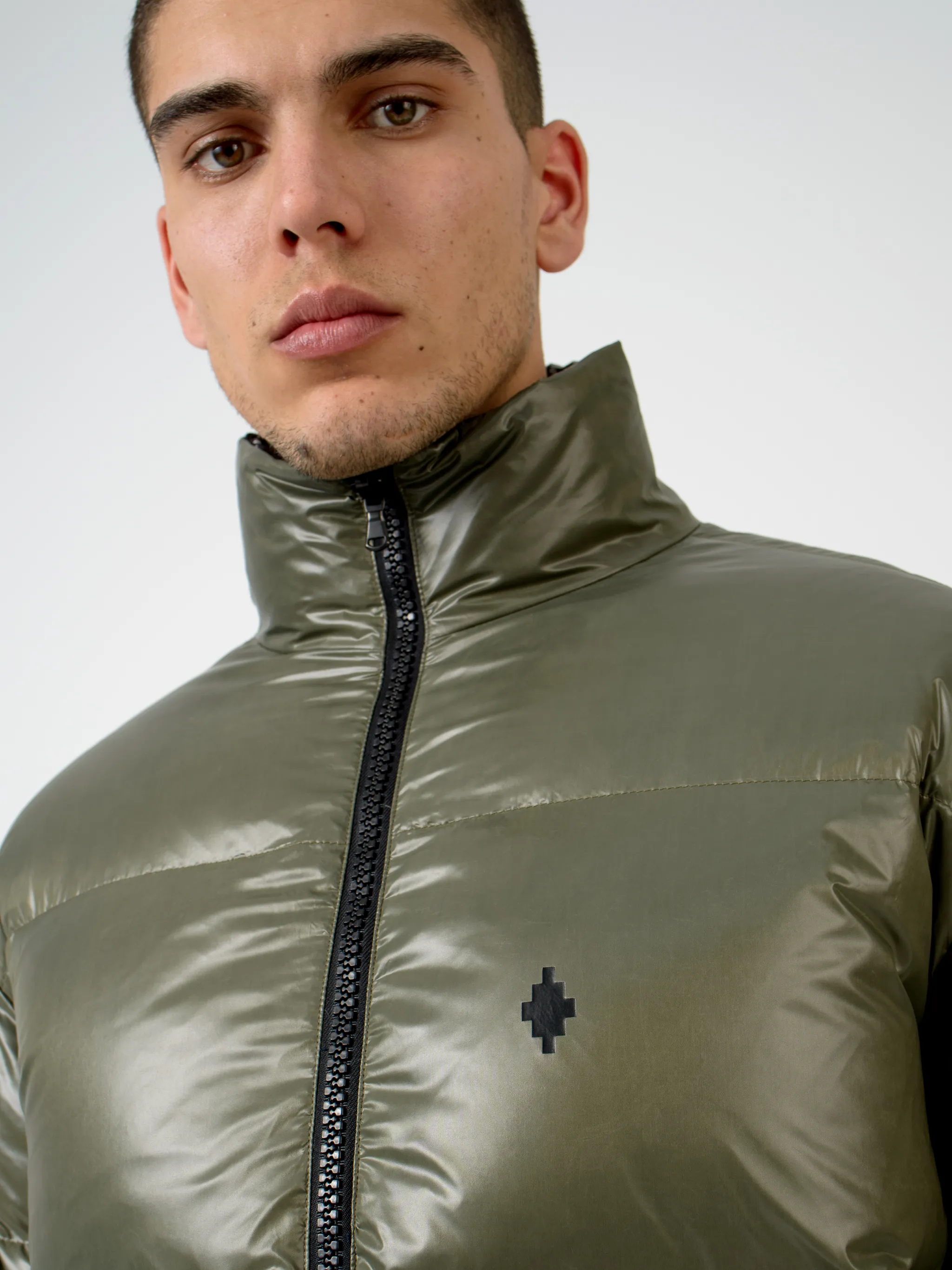 Black/white County logo print padded jacket from Marcelo Burlon County of Milan featuring all-over logo print, padded design, high neck, front zip fastening, two side patch pockets, long sleeves and straight hem.