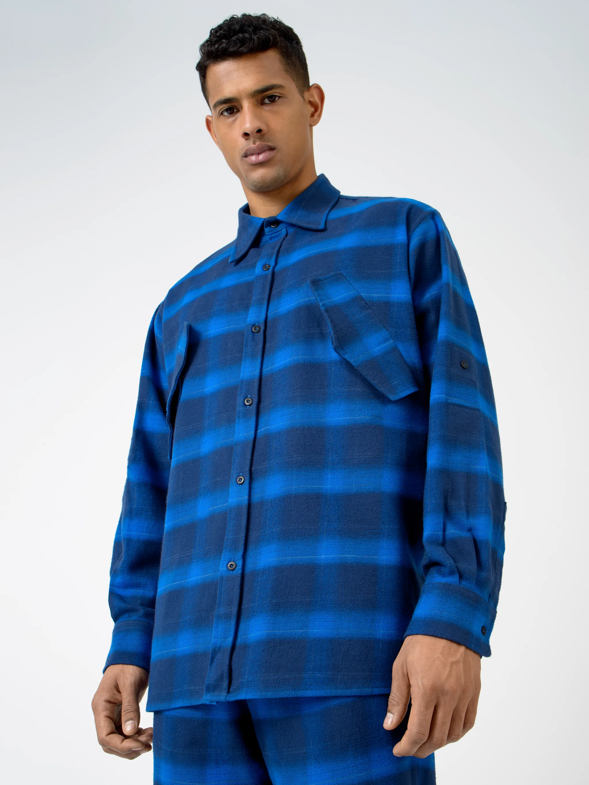 Blue/black cotton logo-print check-pattern shirt from Marcelo Burlon County of Milan featuring check pattern, logo print to the rear, classic collar, front button fastening, long sleeves, two chest flap pockets, buttoned cuffs and straight hem.
