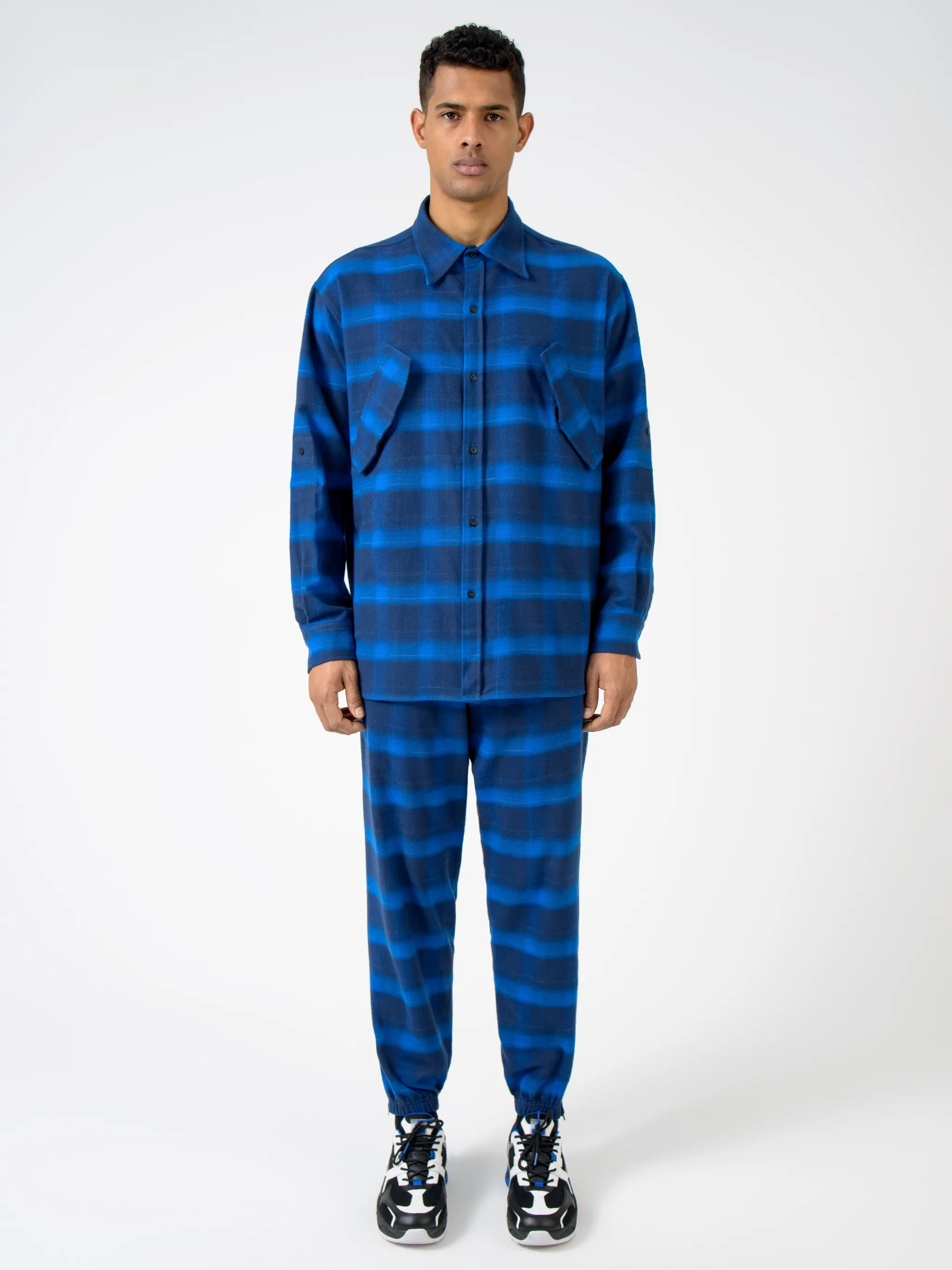 Blue/black cotton logo-print check-pattern shirt from Marcelo Burlon County of Milan featuring check pattern, logo print to the rear, classic collar, front button fastening, long sleeves, two chest flap pockets, buttoned cuffs and straight hem.