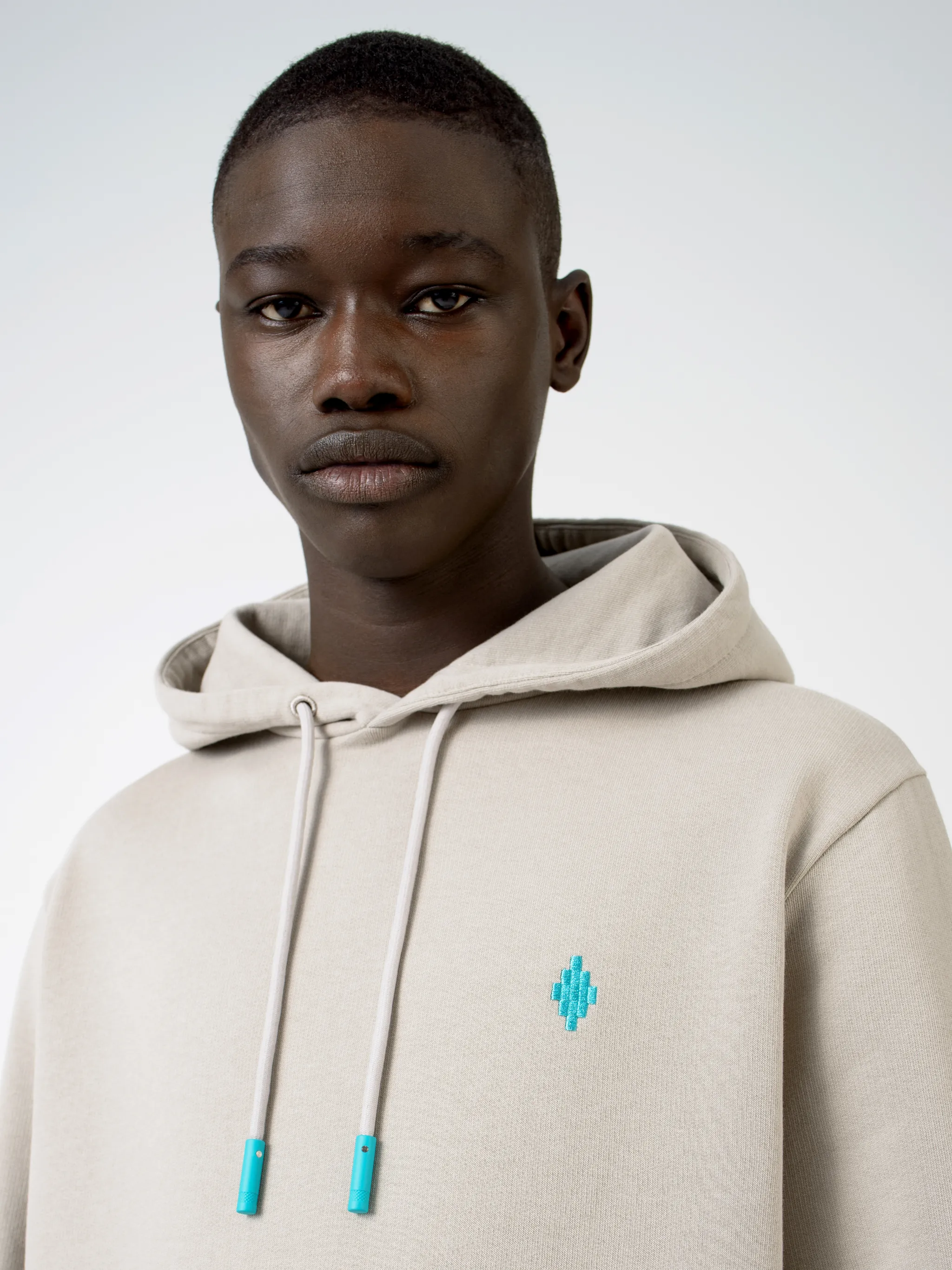 6143 BEIGE TURQUOISE Natural (Veg)->Cotton CROSS HOODIE from Marcelo Burlon County of Milan.