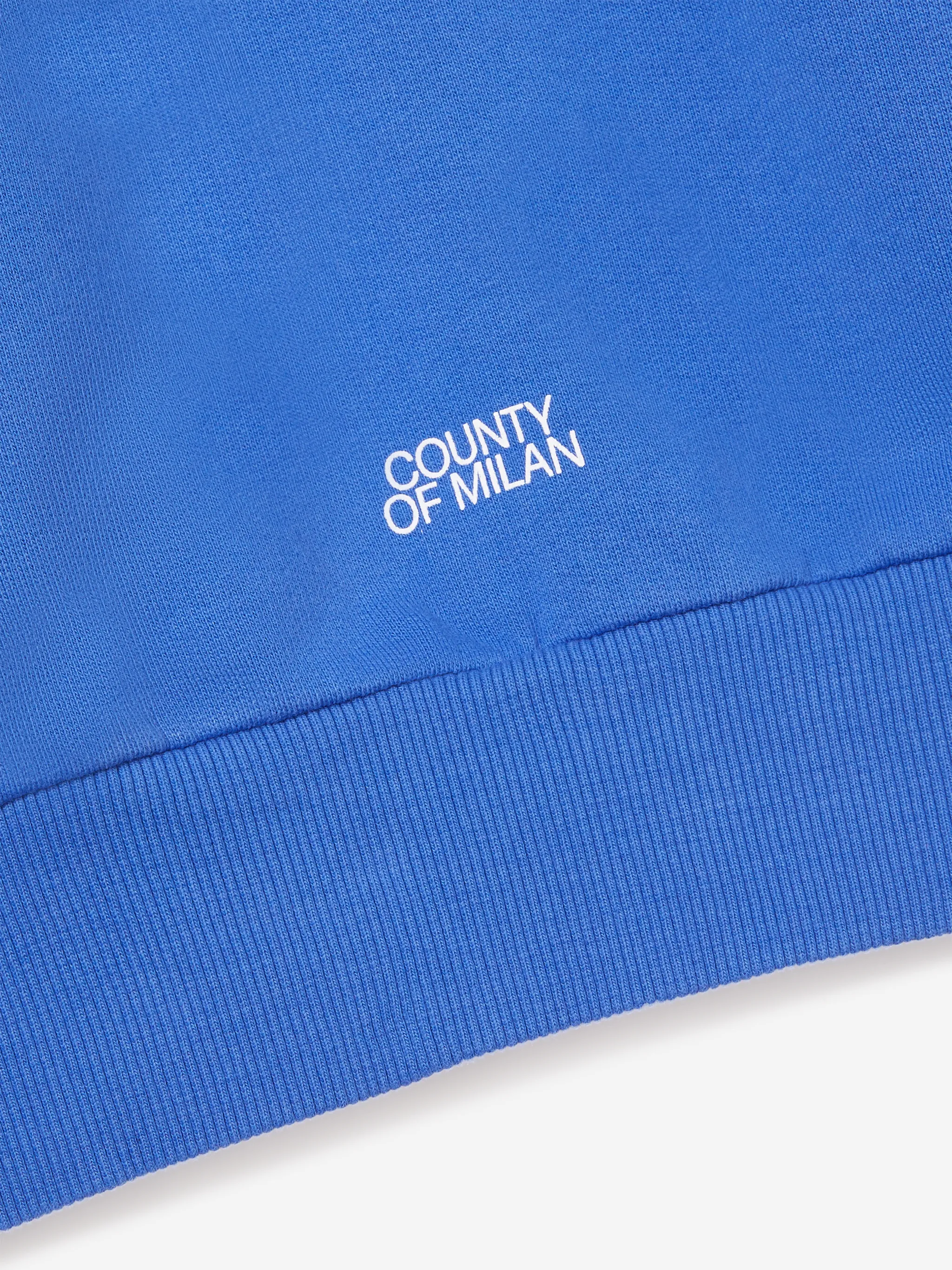 Blue cotton blend cross regular hoodie from Marcelo Burlon County of Milan featuring drawstring hood, embroidered logo at the chest, front pouch pocket, ribbed hem and long sleeves.