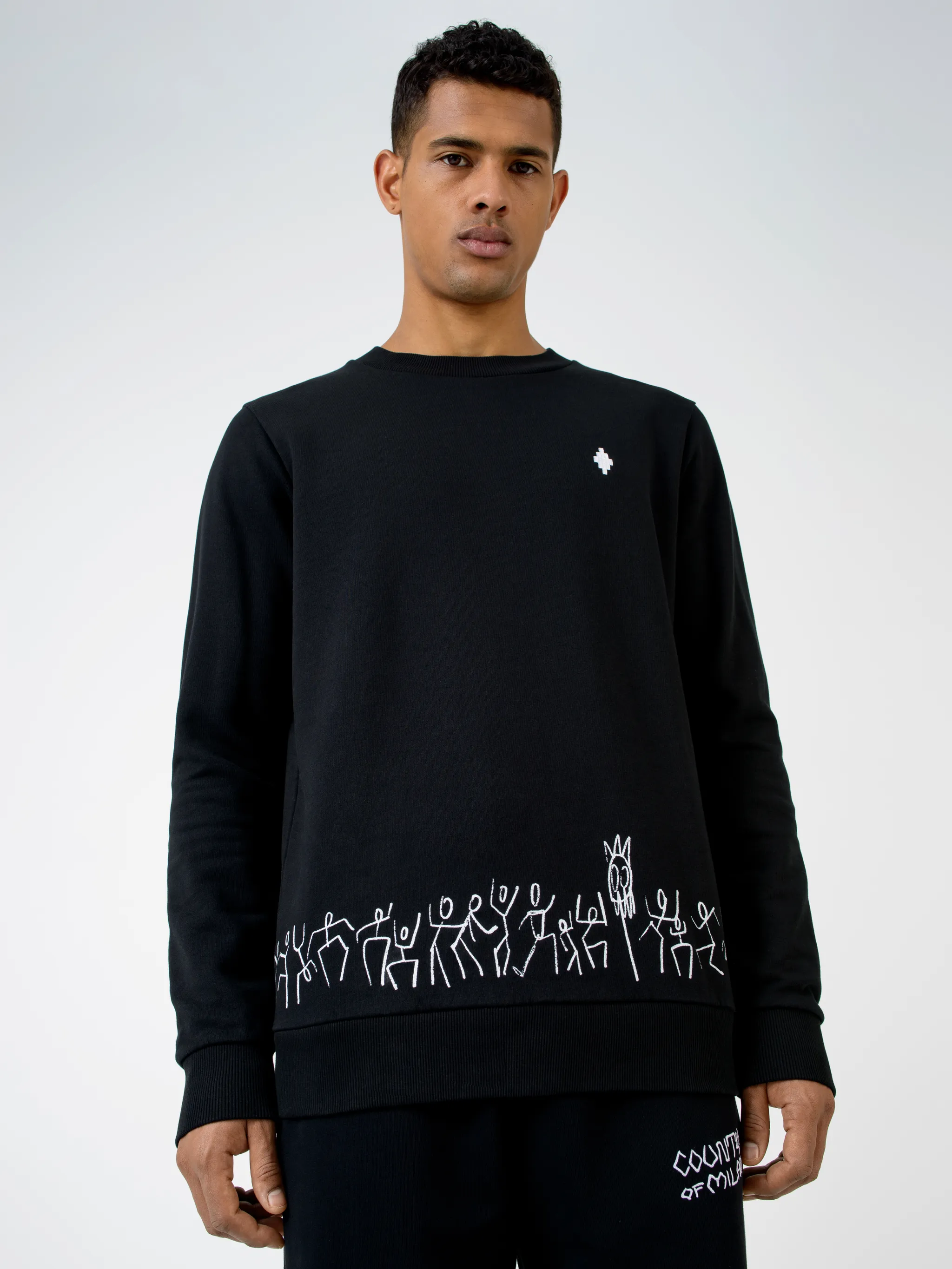 Black cotton Cross Tribe crew-neck sweatshirt from Marcelo Burlon County of Milan featuring embroidered logo at the chest, graphic print, crew neck, long sleeves and straight hem.