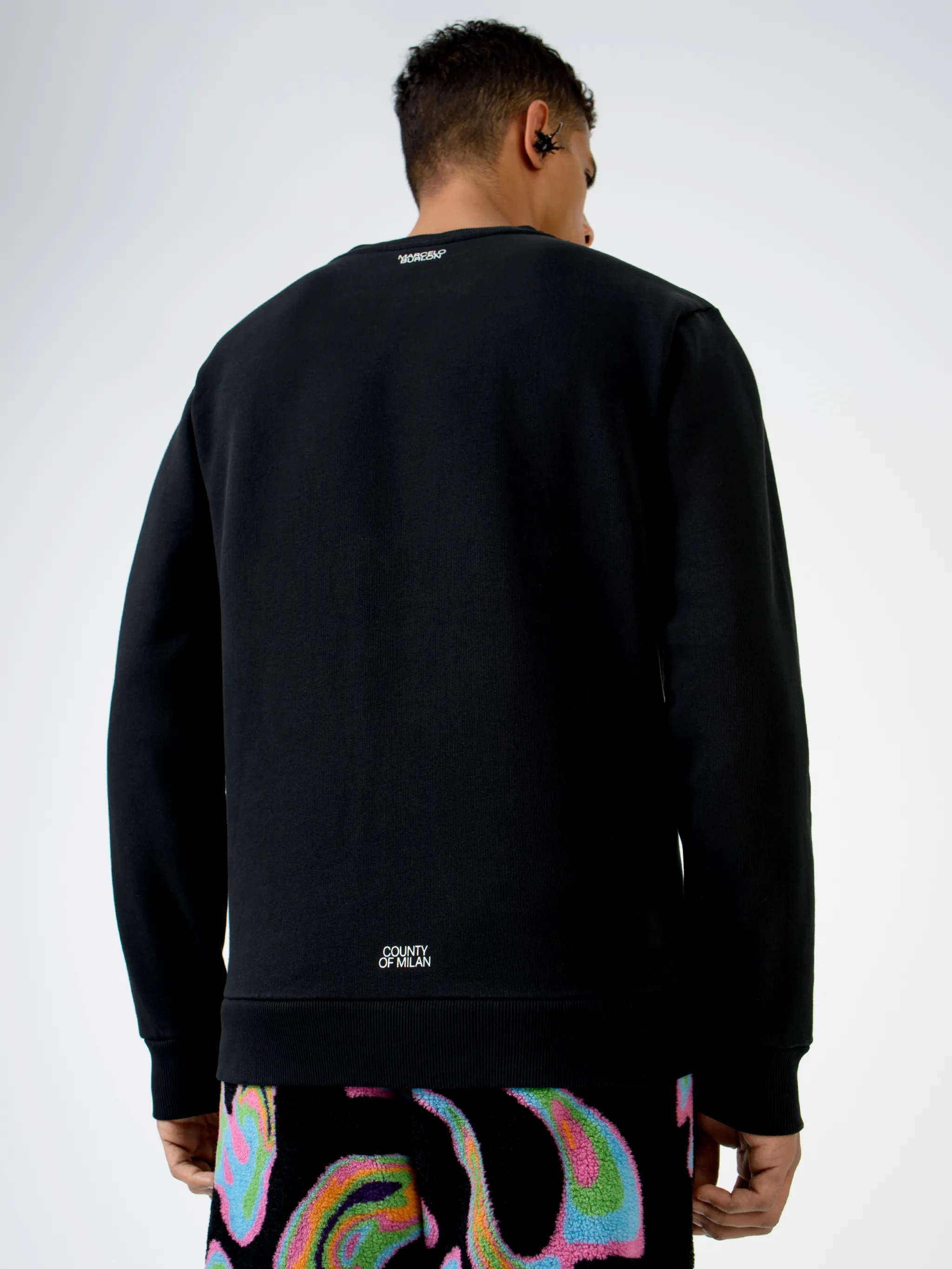 Black cotton Cross crew-neck sweatshirt from Marcelo Burlon County of Milan featuring embroidered logo at the chest, logo print to the rear, crew neck, long sleeves and straight hem.