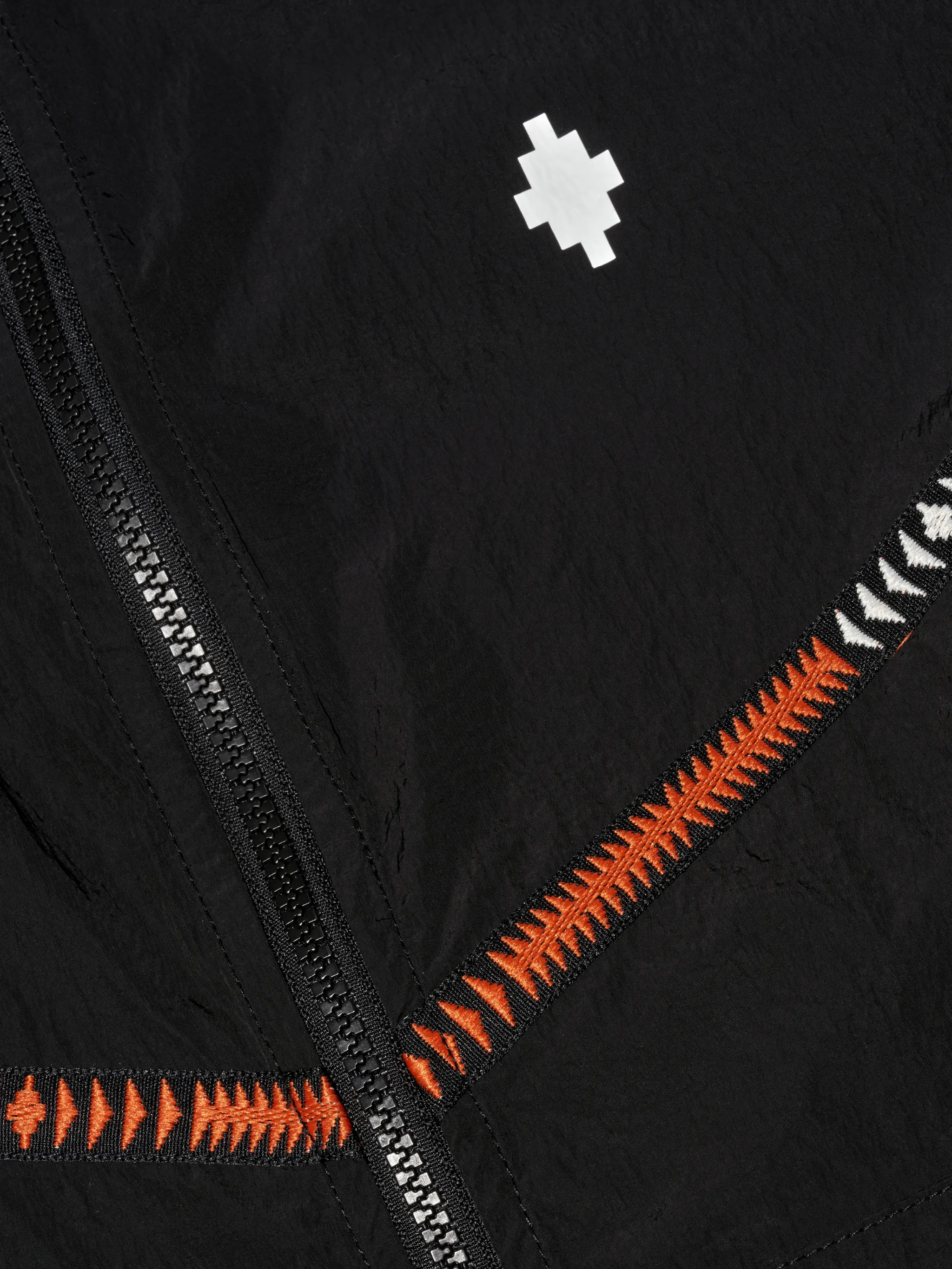 Black/multicolour tape-detail windbreaker from Marcelo Burlon County of Milan featuring drawstring hood, front zip fastening, embroidered logo to the front, geometric embroidery, long sleeves, front zip fastening pockets and elasticated cuffs.