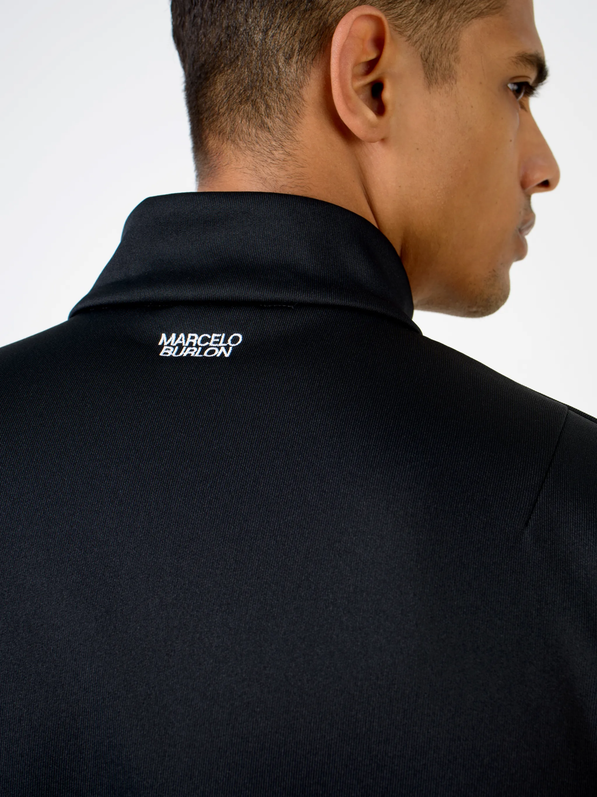 Black cotton-blend logo embroidery zip-up sweatshirt from MARCELO BURLON COUNTY OF MILAN featuring stand-up collar, front zip fastening, embroidered logo, two side slit pockets, long sleeves and loose fit.