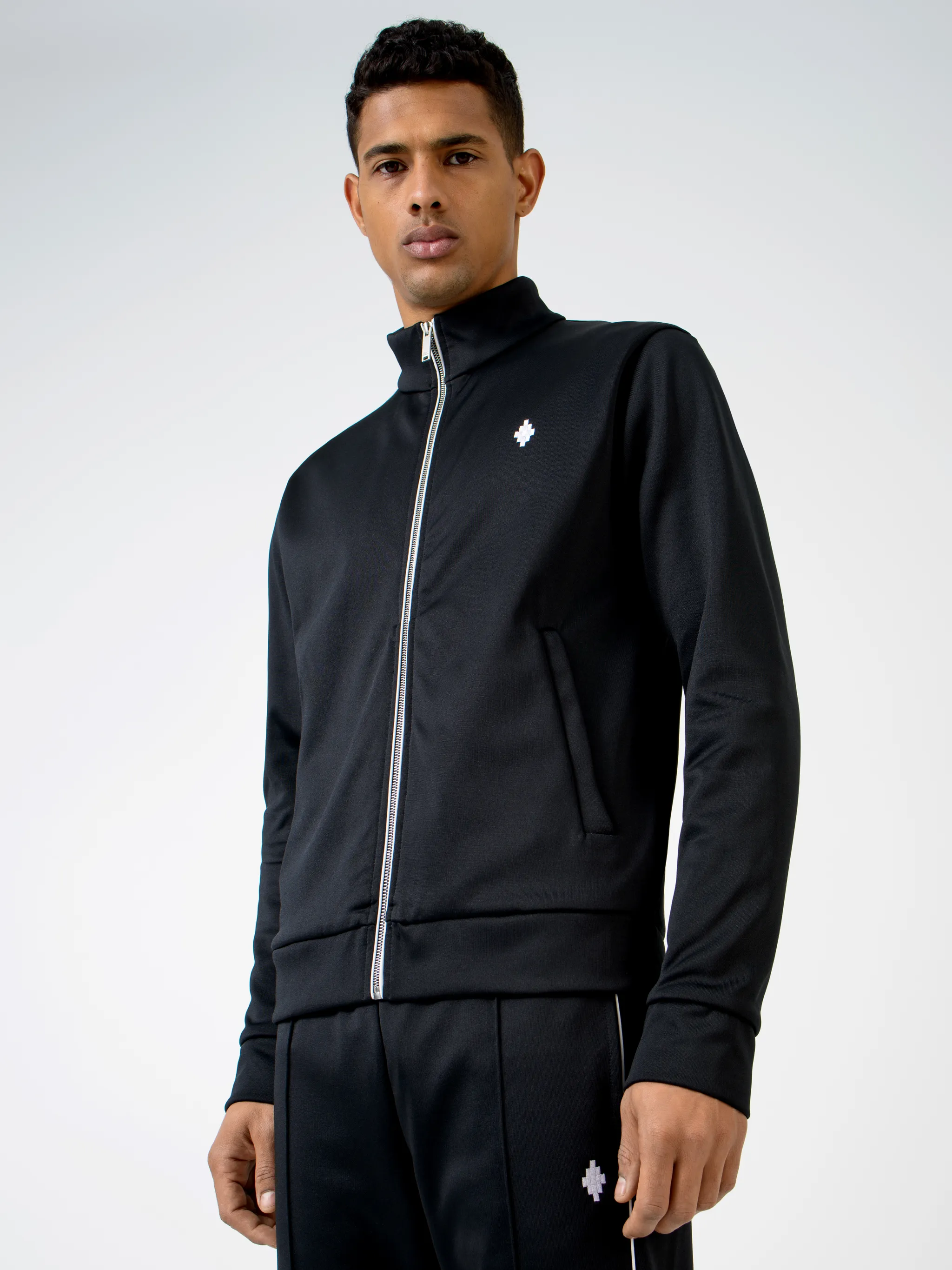 Black cotton-blend logo embroidery zip-up sweatshirt from MARCELO BURLON COUNTY OF MILAN featuring stand-up collar, front zip fastening, embroidered logo, two side slit pockets, long sleeves and loose fit.