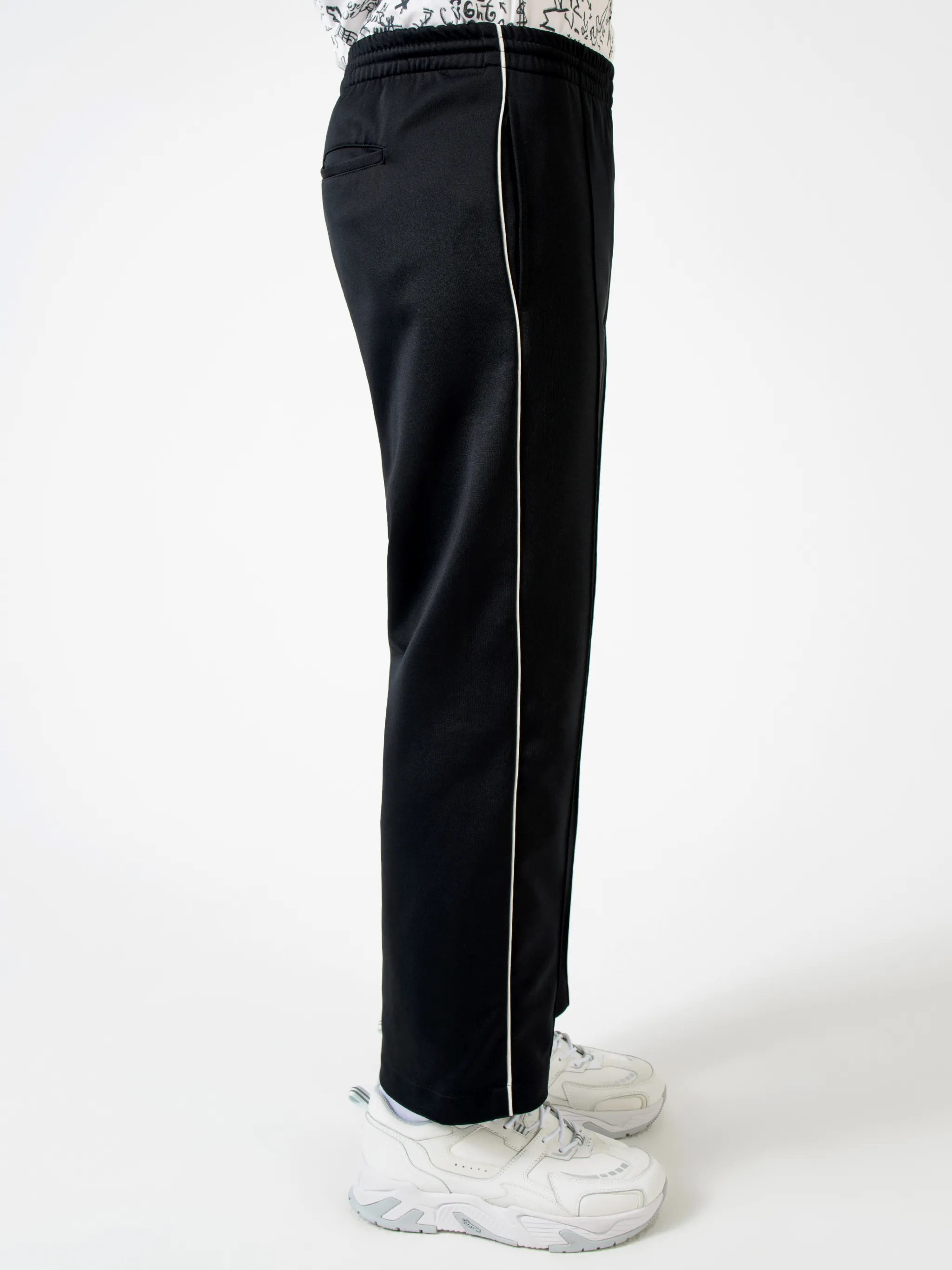 Black cotton-blend logo track pants from MARCELO BURLON COUNTY OF MILAN featuring elasticated waistband, embroidered logo, two side slit pockets, rear welt pocket, side stripe detailing and loose fit.