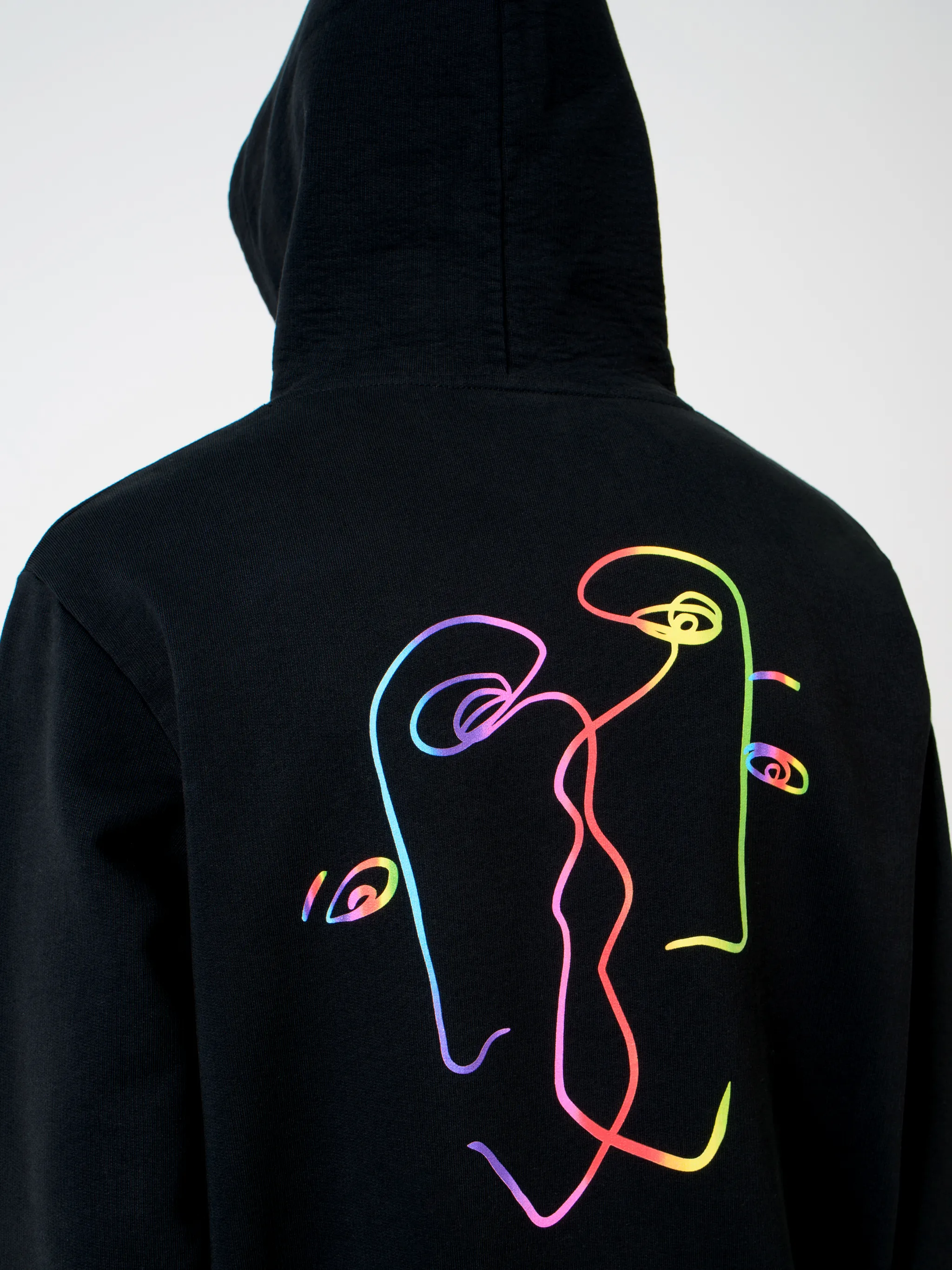 Black cotton logo print hoodie from MARCELO BURLON COUNTY OF MILAN featuring drawstring hood, logo print to the front, long sleeves, abstract pattern print, kangaroo pocket and loose fit.