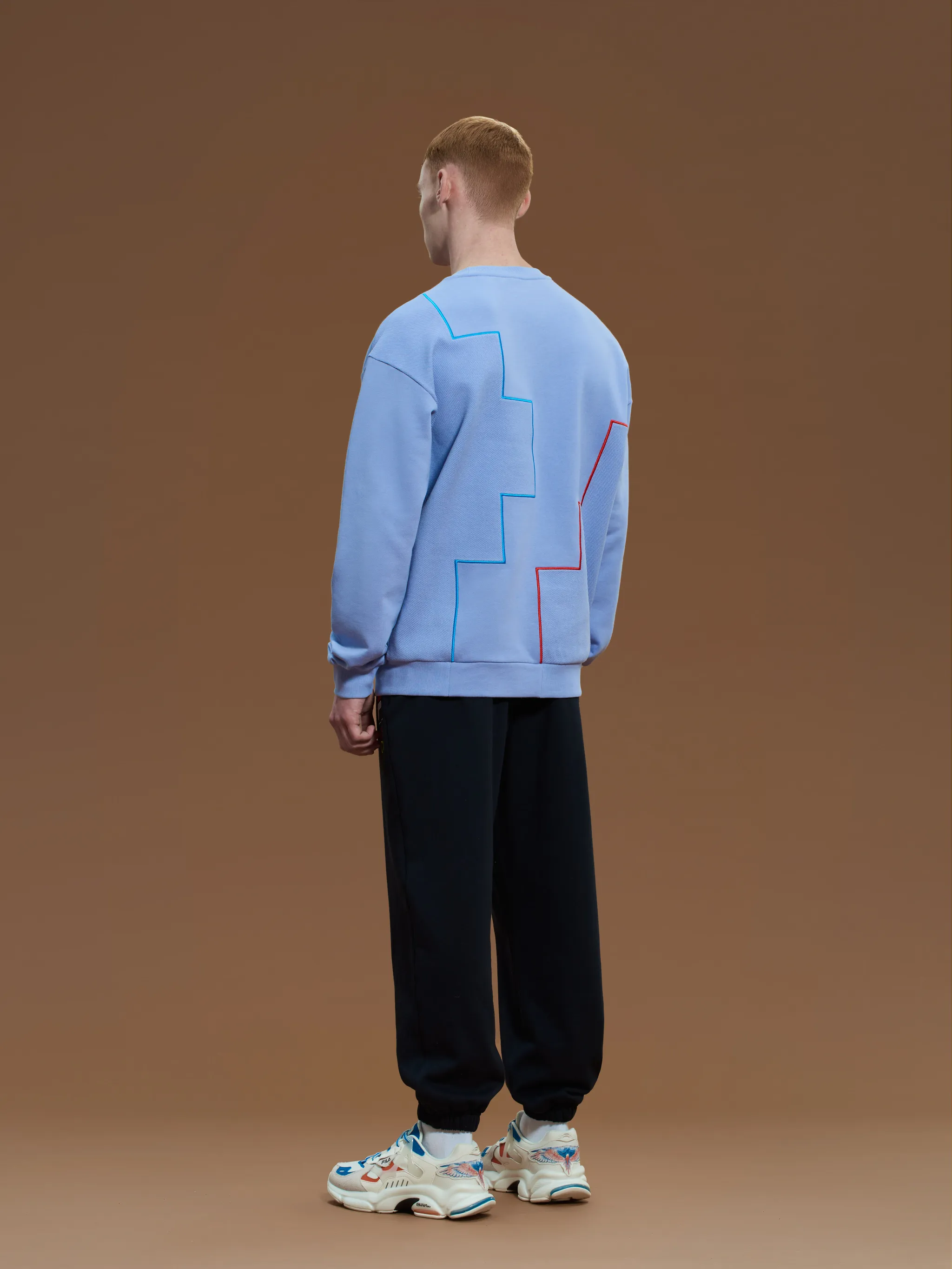 Lilac cotton x FILA logo patch sweatshirt from Marcelo Burlon County of Milan featuring logo patch to the front, front pouch pocket, crew neck, long sleeves and straight hem.