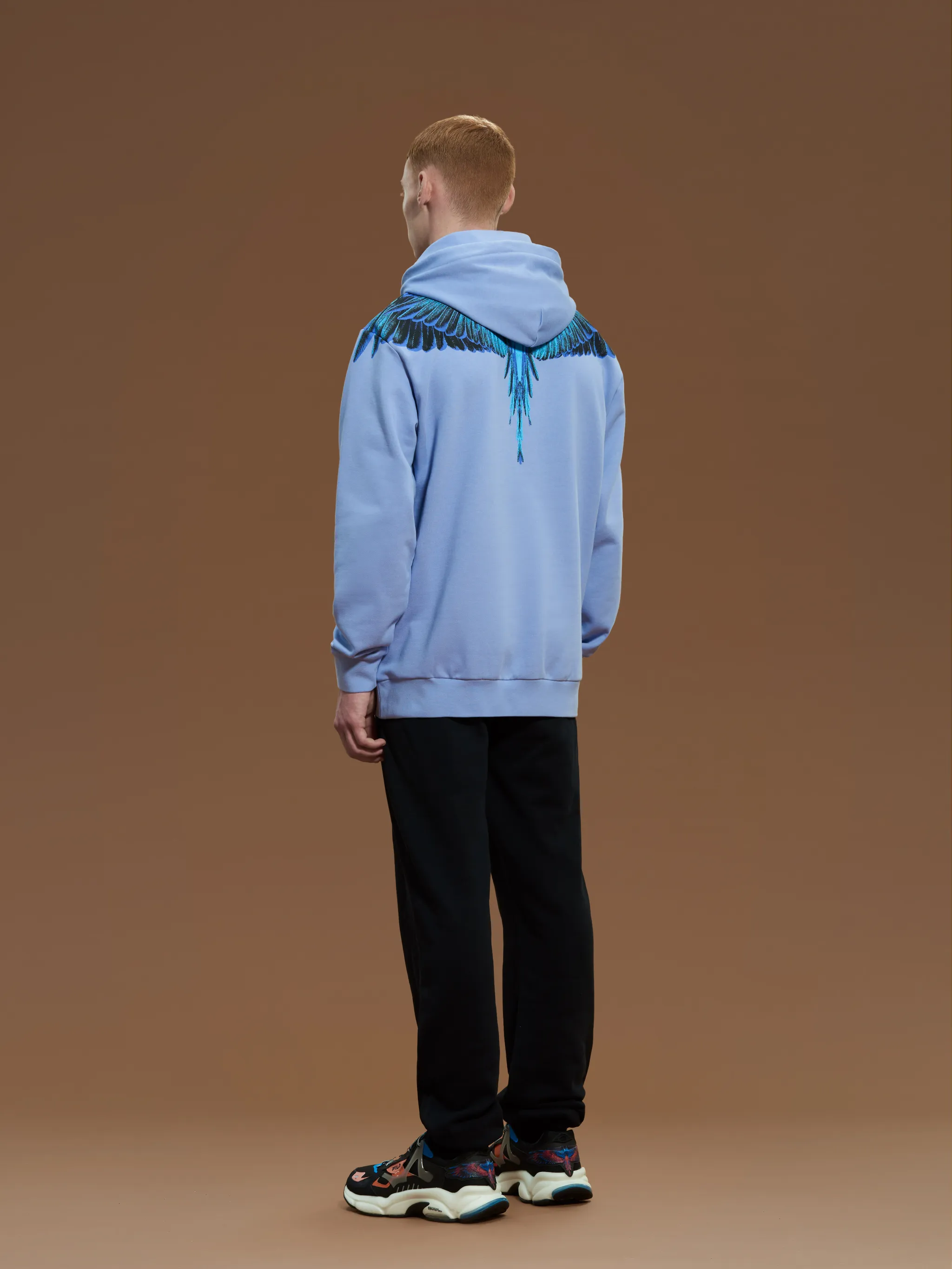 Blue/lilac cotton feather print hoodie from Marcelo Burlon County of Milan featuring feather print, logo patch to the front, drawstring hood, slip pockets to the sides, long sleeves and straight hem.