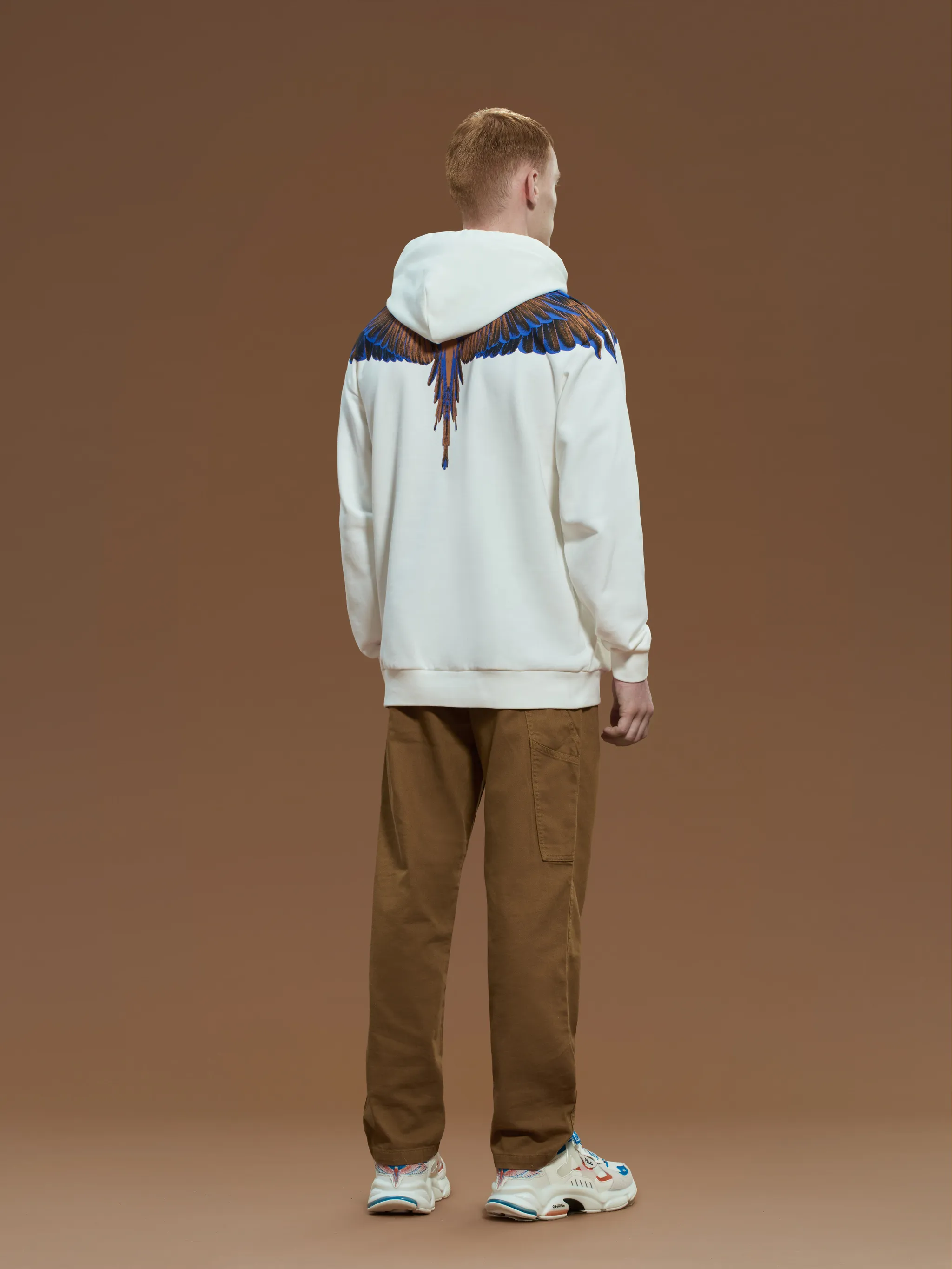 White/multicolour cotton x FILA feather print hoodie from Marcelo Burlon County of Milan featuring feather print, logo patch to the front, drawstring hood, slip pockets to the sides, long sleeves and straight hem.